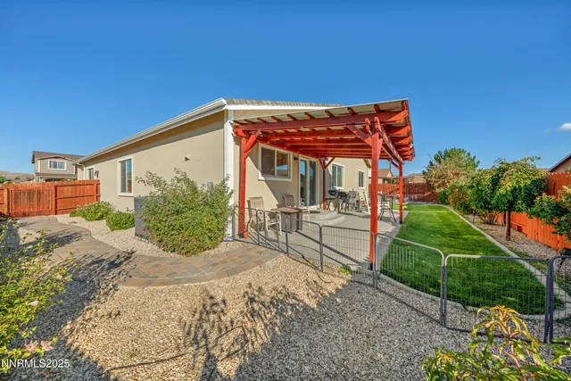 an aerial view of residential houses and outdoor space
