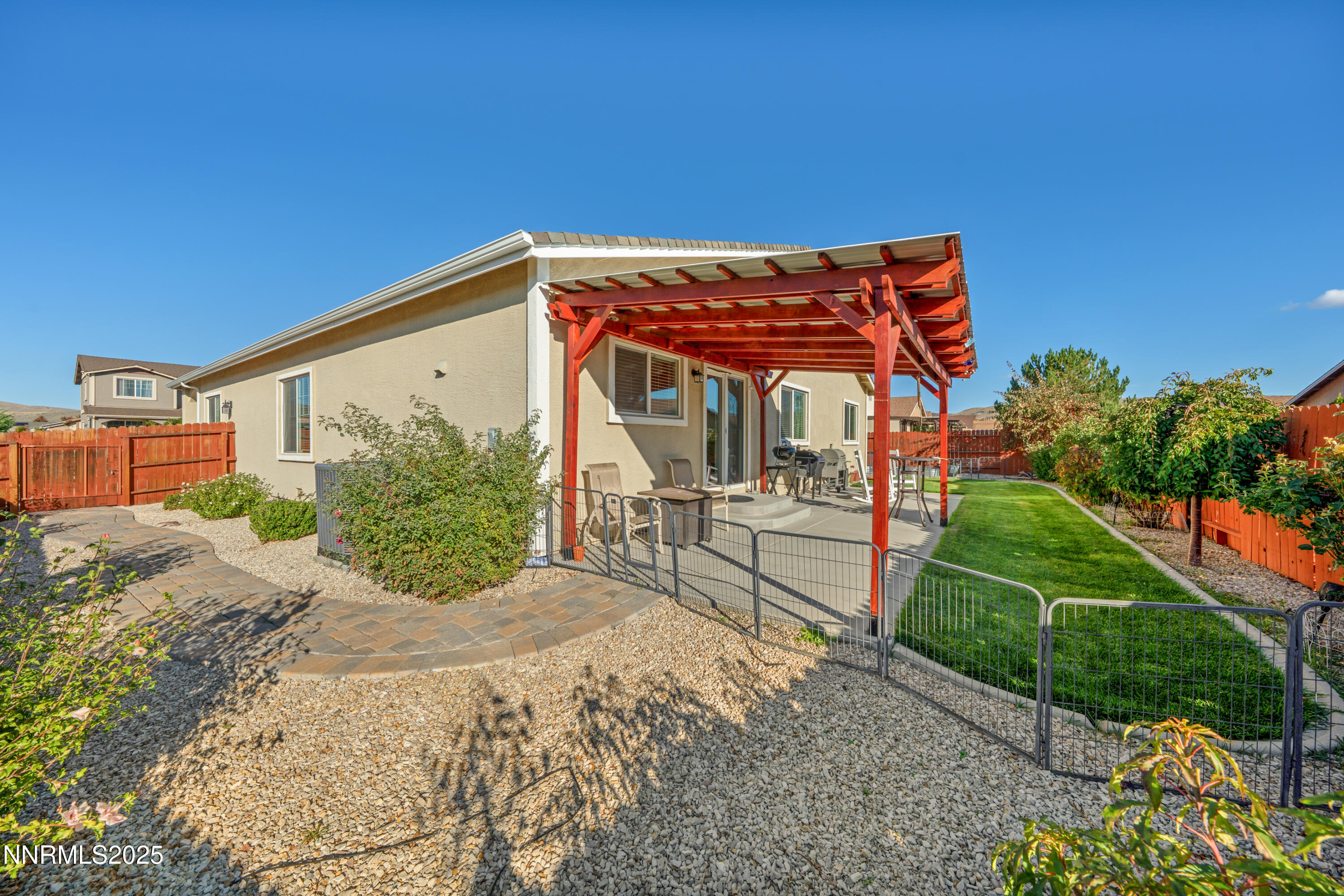 18520 Silverbell Court Reno, NV 89508 - Photo 45 of 60 a front view of a house with a yard