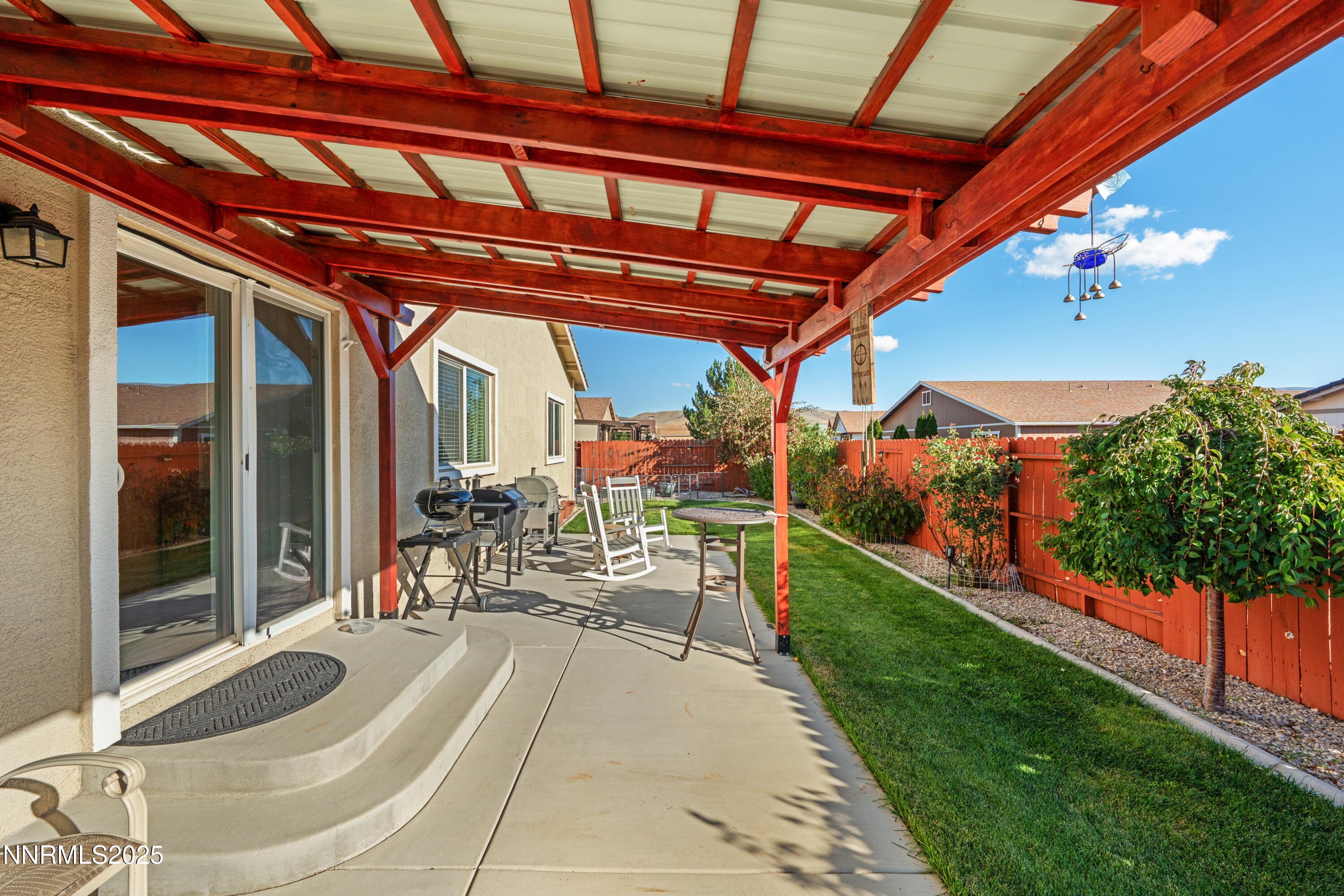 18520 Silverbell Court Reno, NV 89508 - Photo 46 of 60 a view of a porch with furniture and garden view