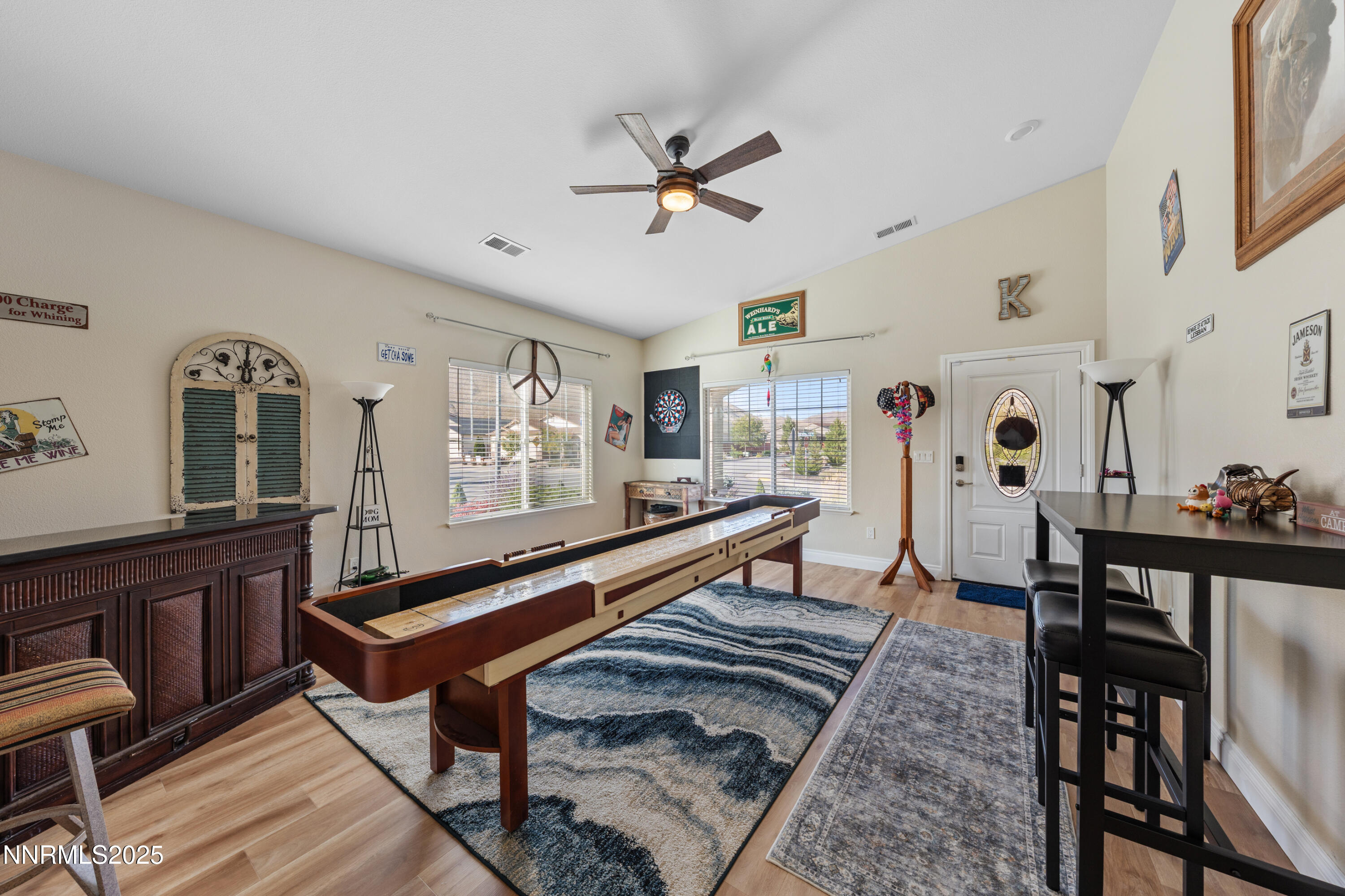 18520 Silverbell Court Reno, NV 89508 - Photo 8 of 60 a living room with furniture a rug and a window