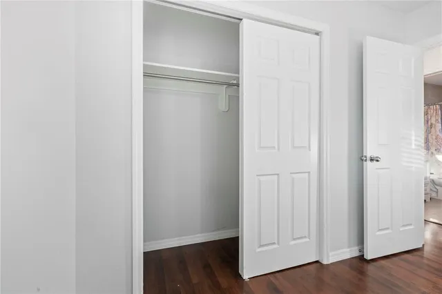 a view of front door with wooden floor