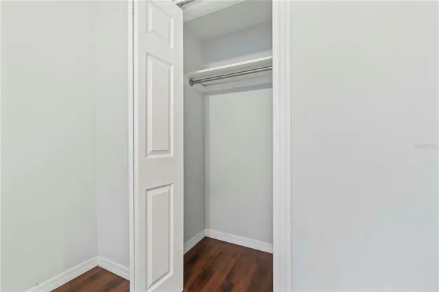 a view of front door with wooden floor