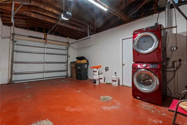 a view of a storage & utility room with washer and dryer