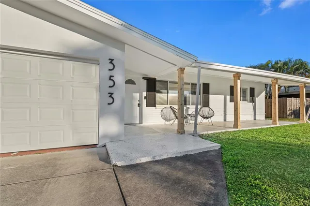 a view of a porch with a backyard