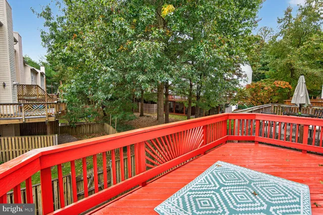 a view of swimming pool with a balcony