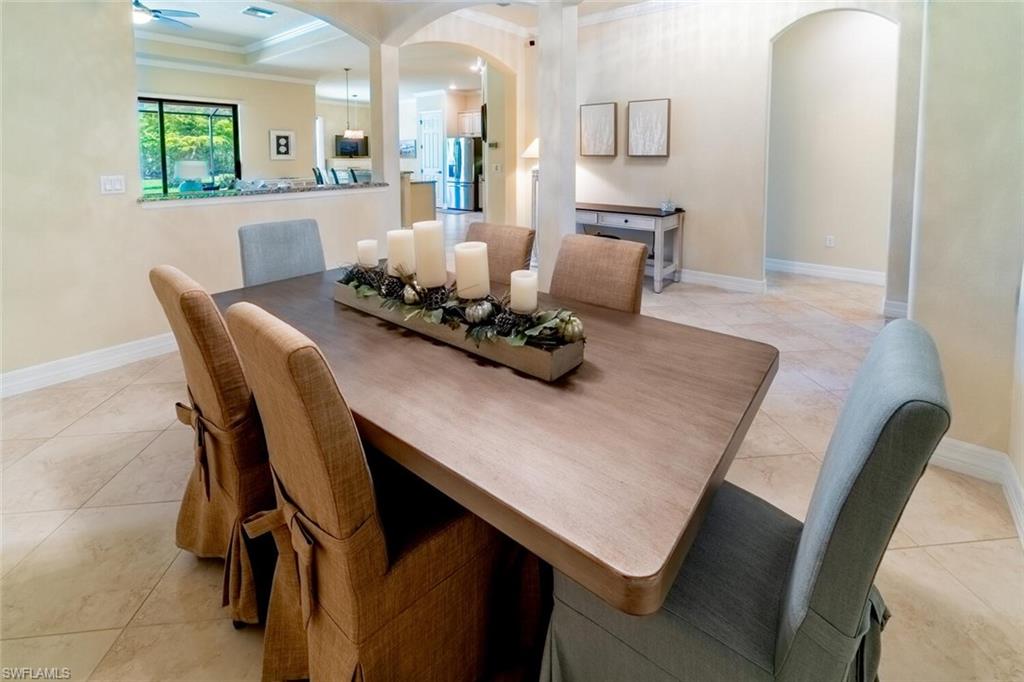 9372 Vercelli Court Naples, FL 34113 - Photo 18 of 50 a living room with furniture