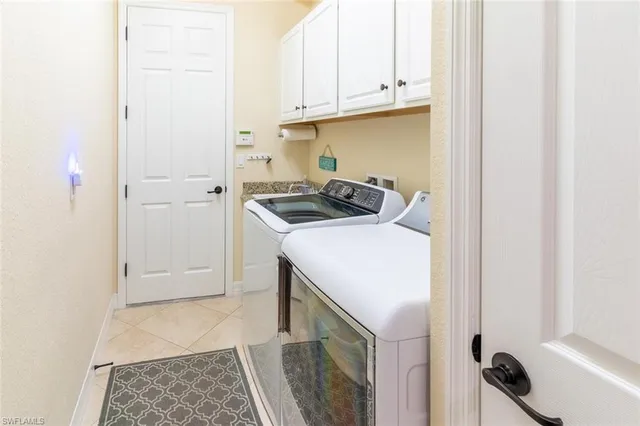 a kitchen with a stove and a refrigerator