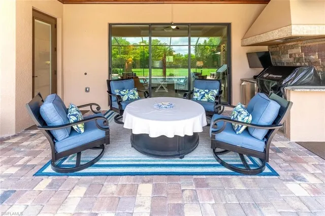 a view of a dining room with furniture wooden floor and a rug