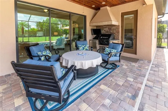 a outdoor space with patio the couches and a dining table with garden view