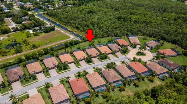 an aerial view of swimming pool and outdoor space