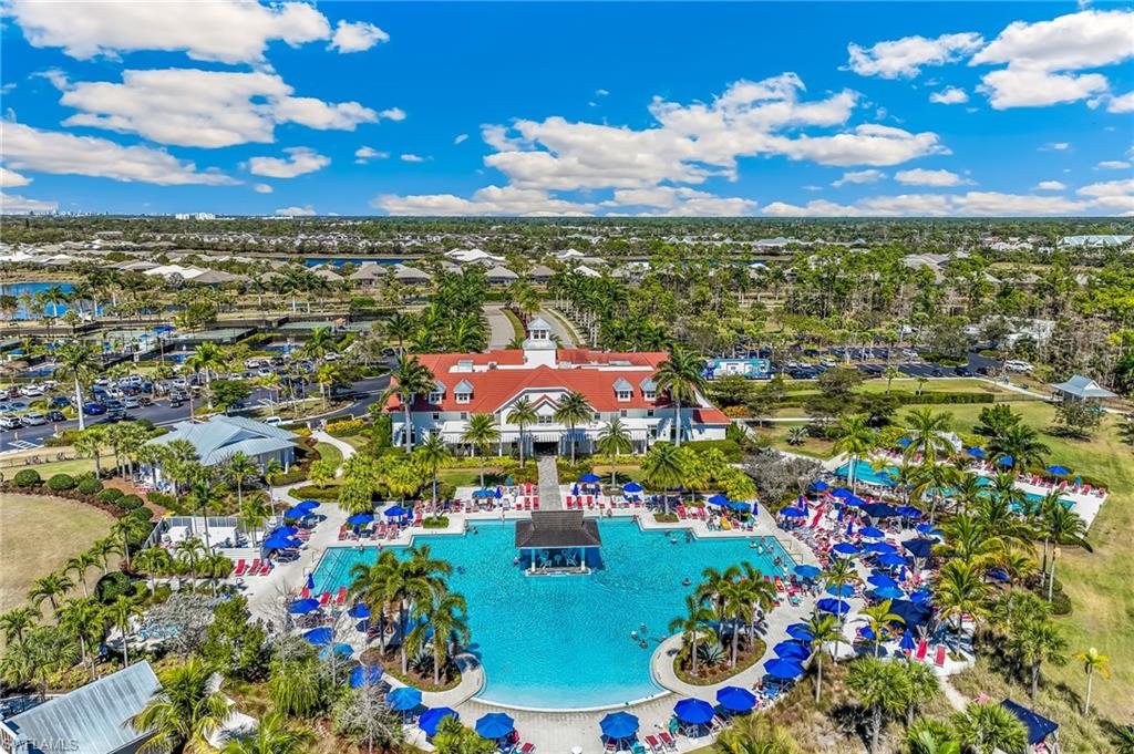 6939 Cay Court Naples, FL 34113 - Photo 27 of 30 a view of city and swimming pool