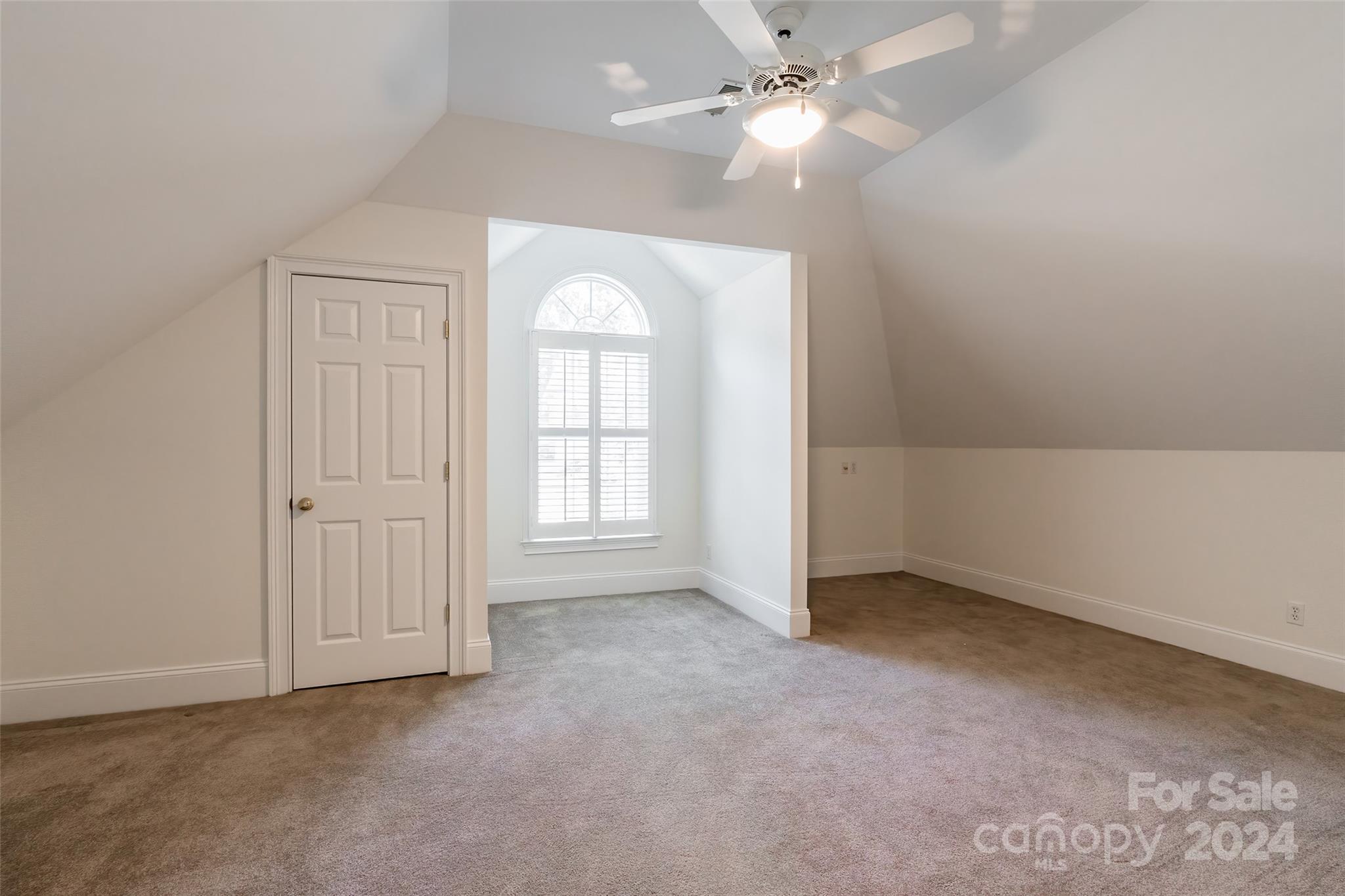 738 Portpatrick Place Fort Mill, SC 29708 - Photo 13 of 27 an empty room with windows and fan