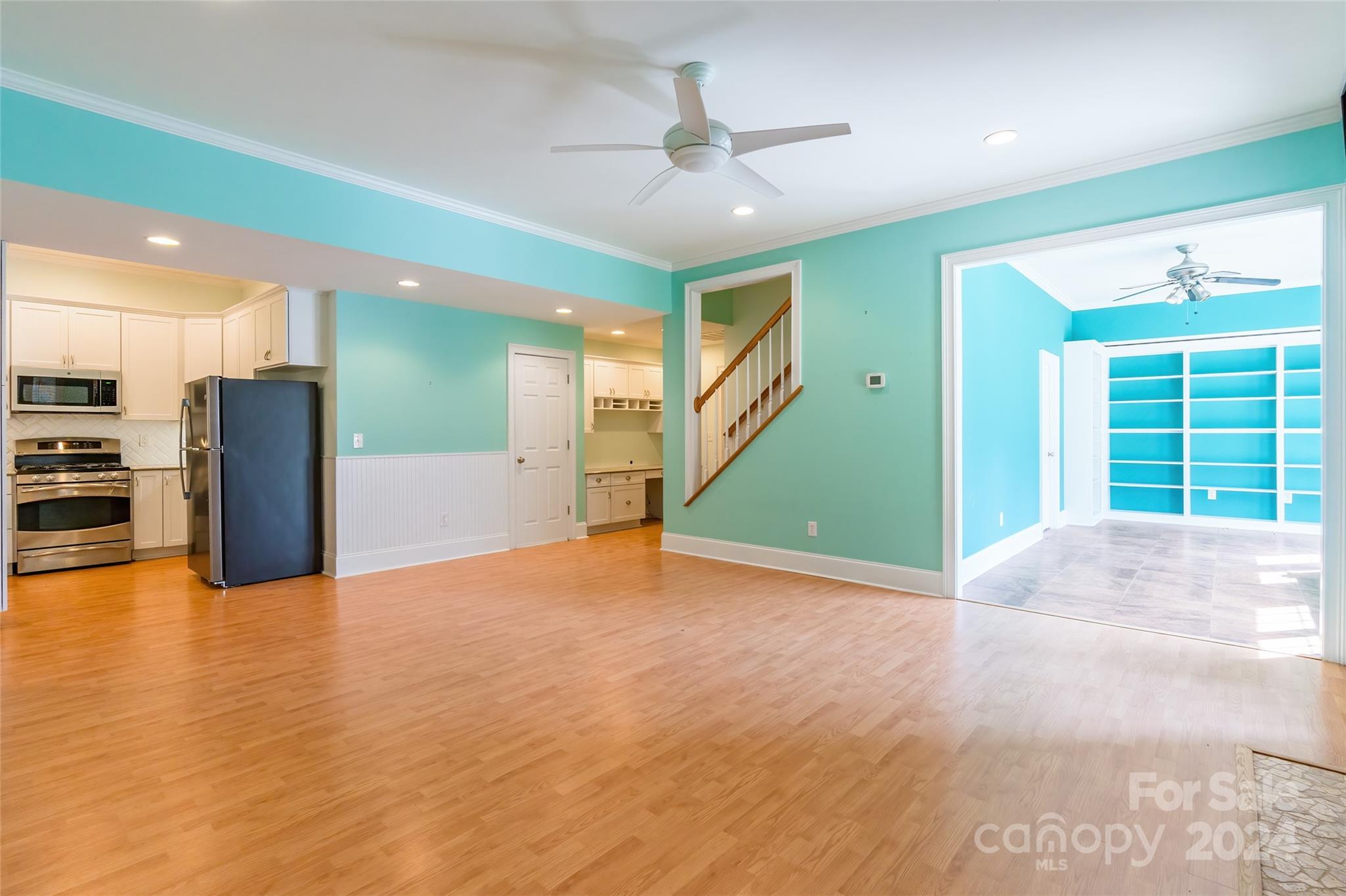 738 Portpatrick Place Fort Mill, SC 29708 - Photo 17 of 27 a view of an empty room with a window and kitchen view