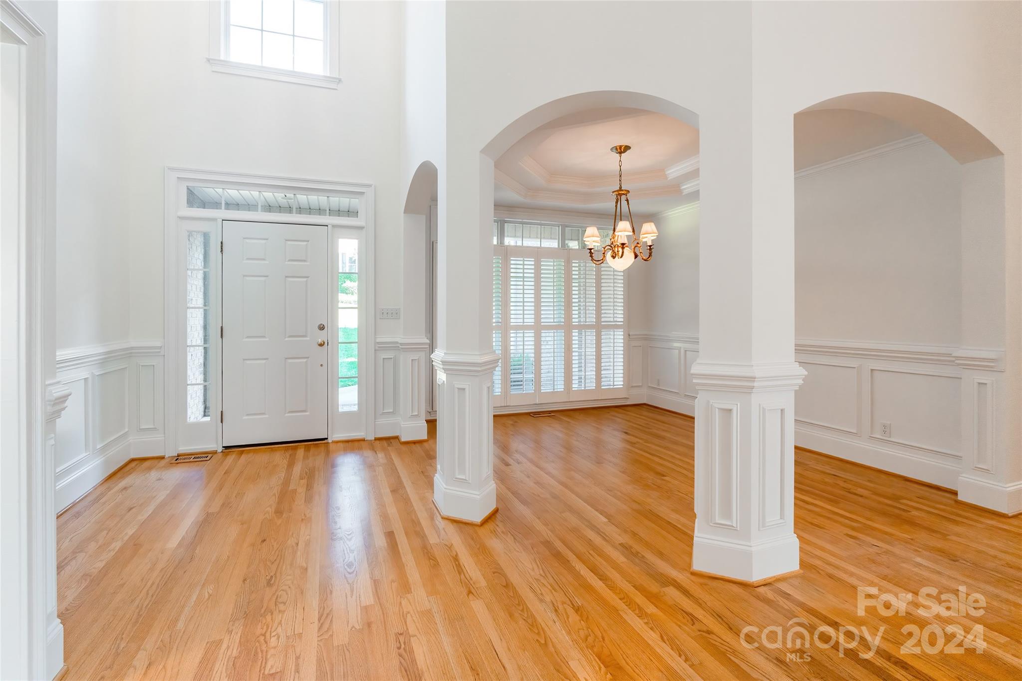 738 Portpatrick Place Fort Mill, SC 29708 - Photo 2 of 27 a view of empty room with wooden floor