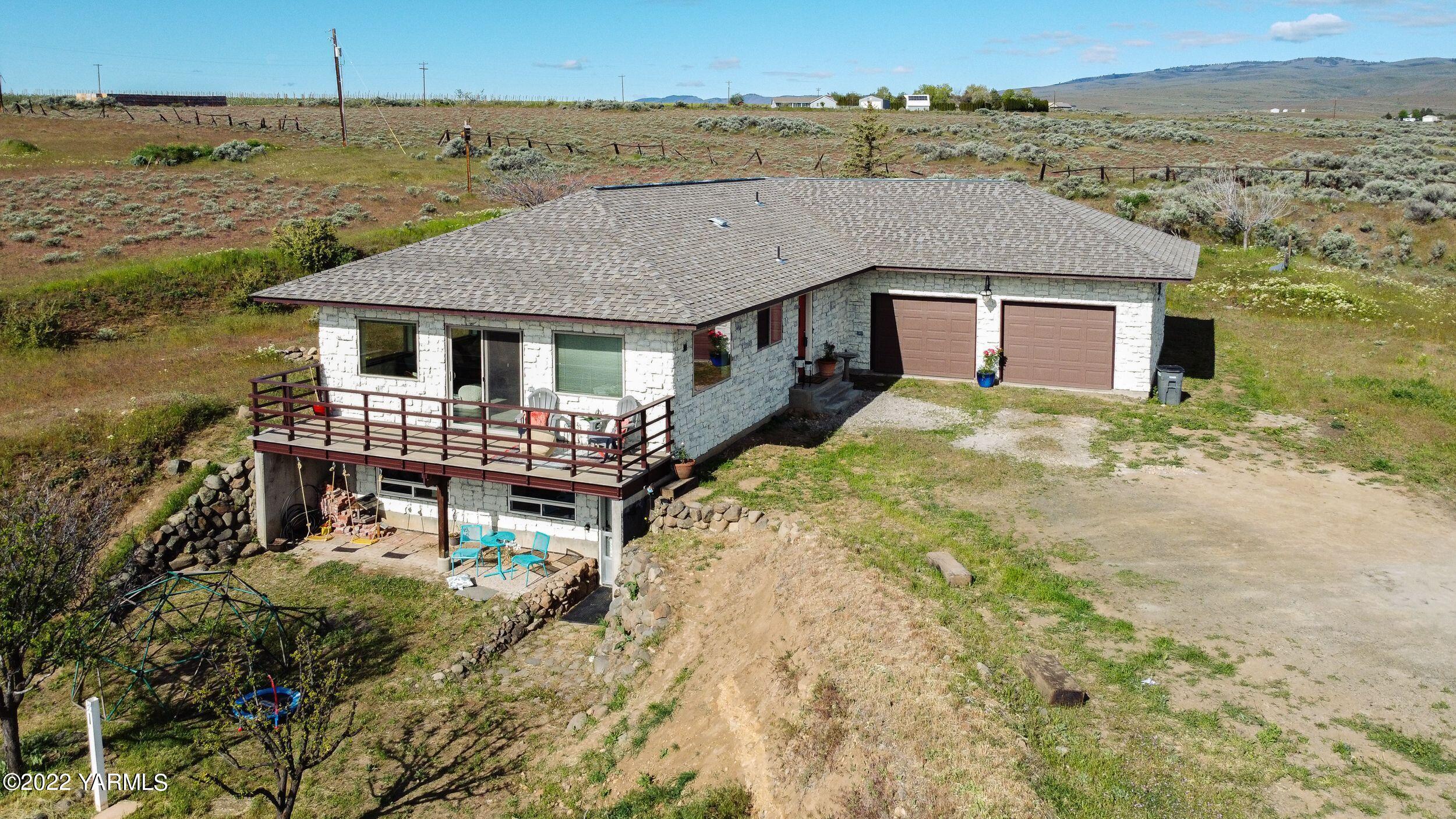 2450 Cook Road Yakima, WA 98908 - Photo 47 of 52 an aerial view of a house with a yard