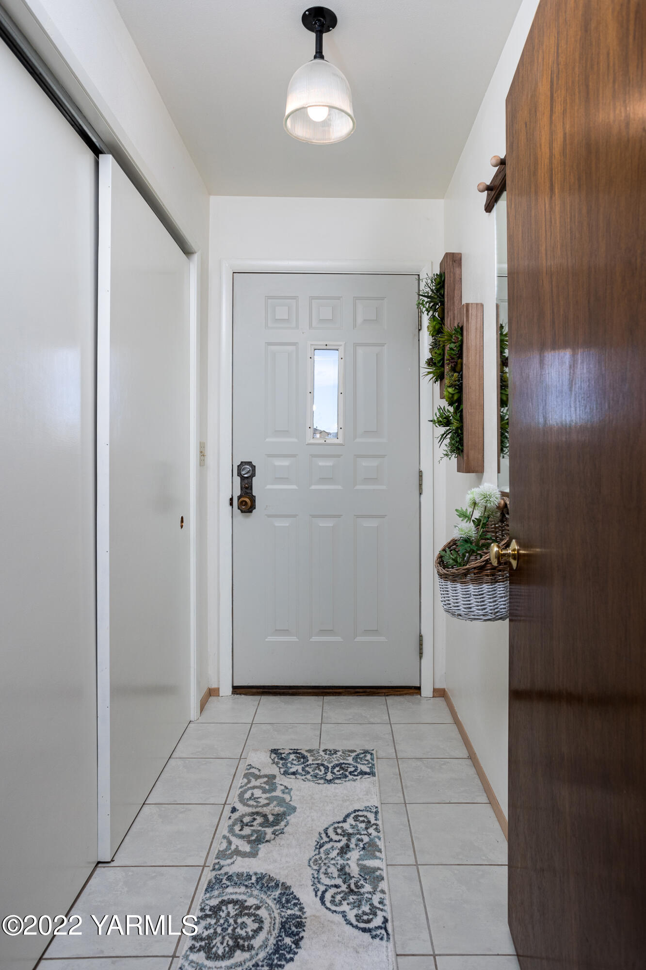 2450 Cook Road Yakima, WA 98908 - Photo 7 of 52 a view of a refrigerator in kitchen and wooden floor