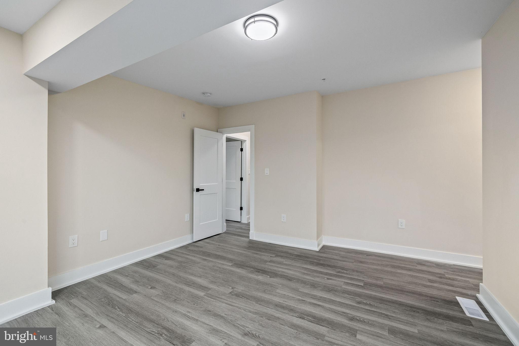 3517 14th Street Northwest, Unit 301 Washington, DC 20010 - Photo 19 of 27 a view of room with wooden floor