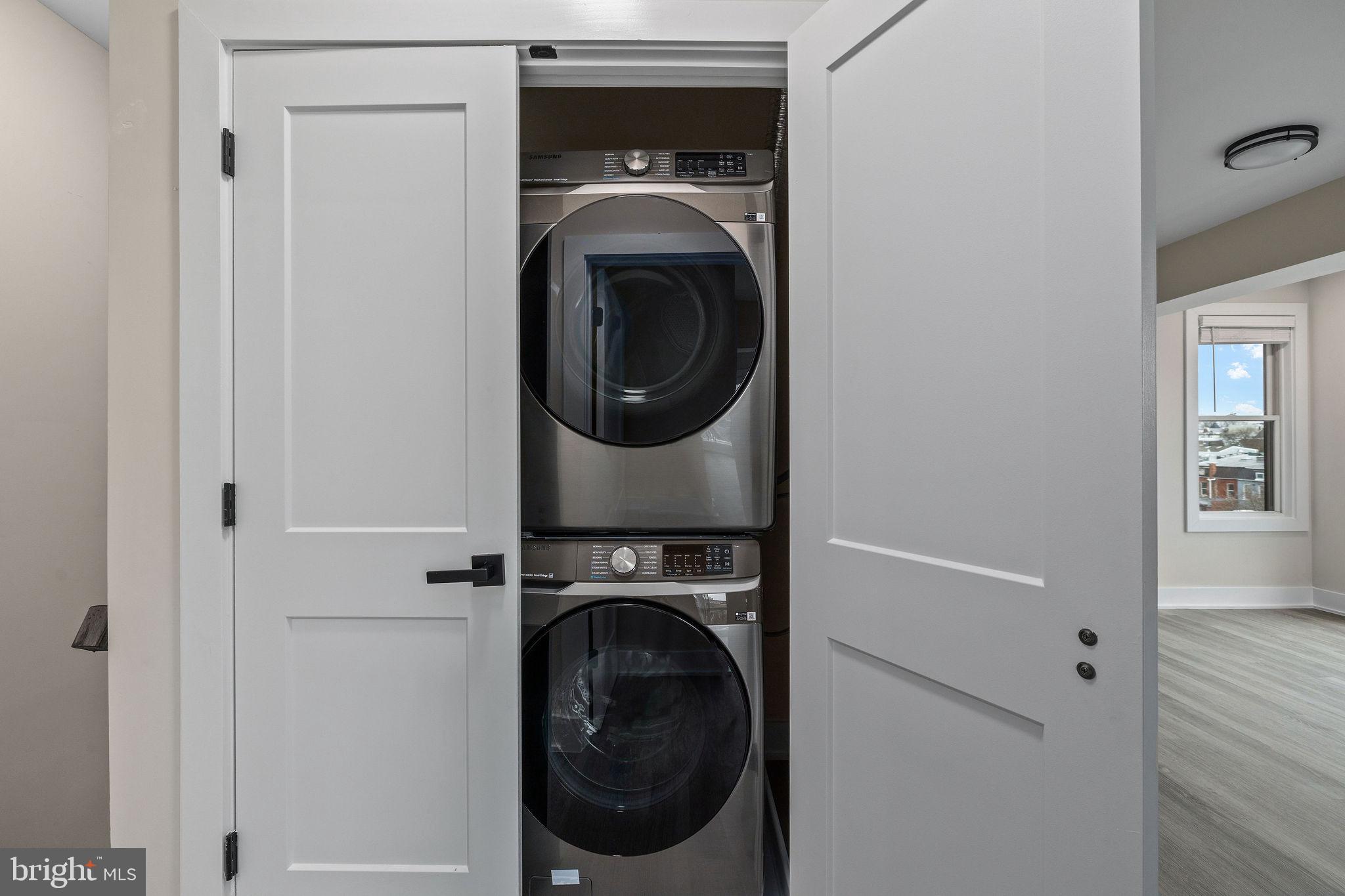 3517 14th Street Northwest, Unit 301 Washington, DC 20010 - Photo 25 of 27 a utility room with dryer and washer