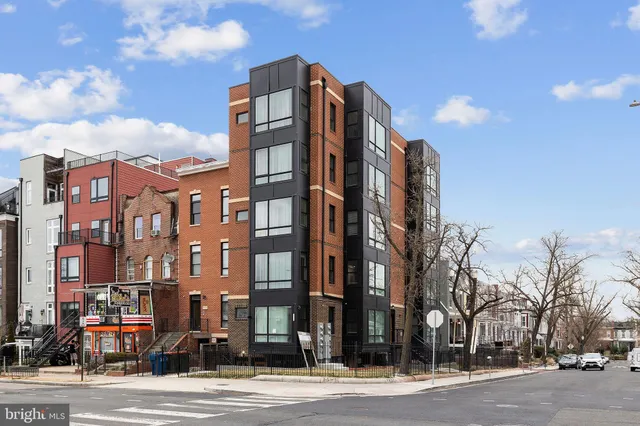 a view of a building and a street