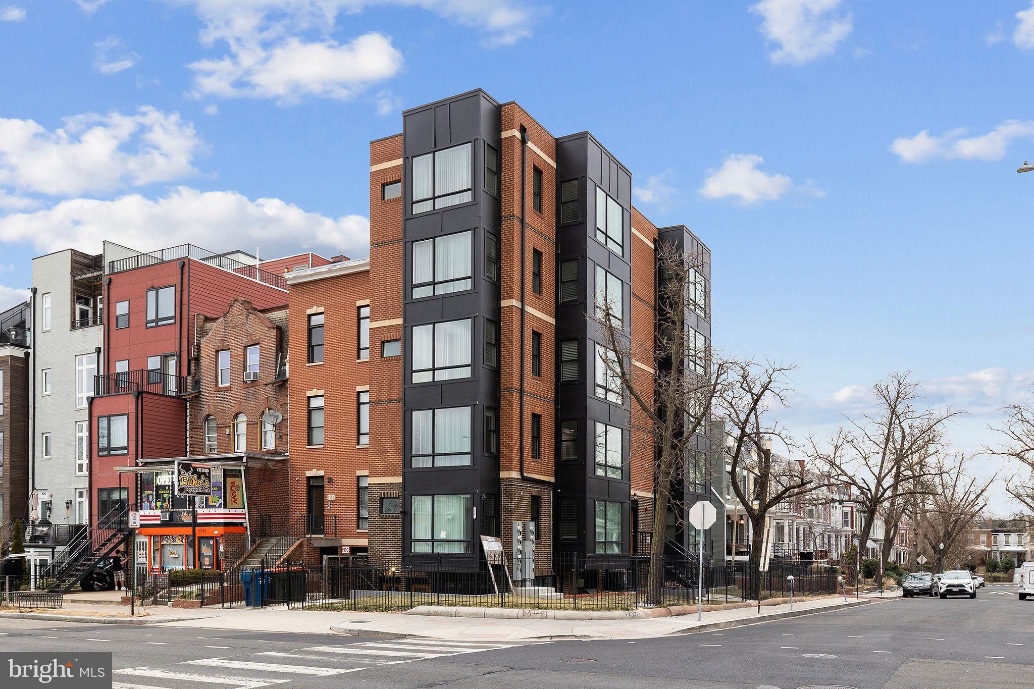 3517 14th Street Northwest, Unit 301 Washington, DC 20010 - Photo 3 of 27 a view of a building and a street
