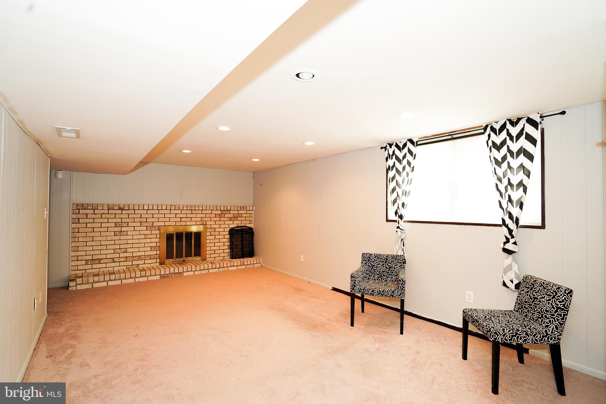 11723 Butlers Branch Road Clinton, MD 20735 - Photo 11 of 12 BASEMENT W/ FIREPLACE