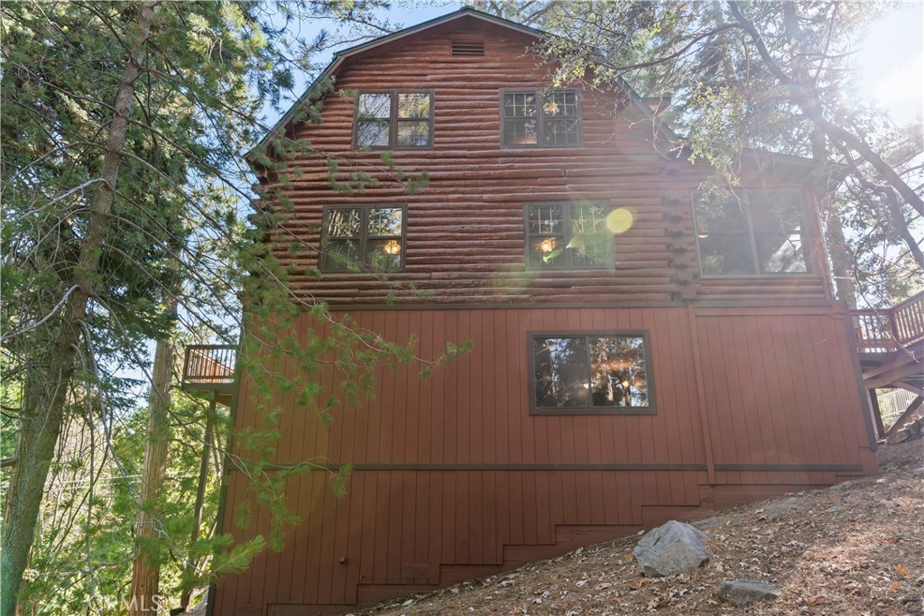 26638 Lake Forest Drive Twin Peaks, CA 92391 - Photo 13 of 72 a view of a house with a tree