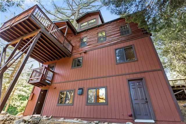 a view of a door and wooden floor