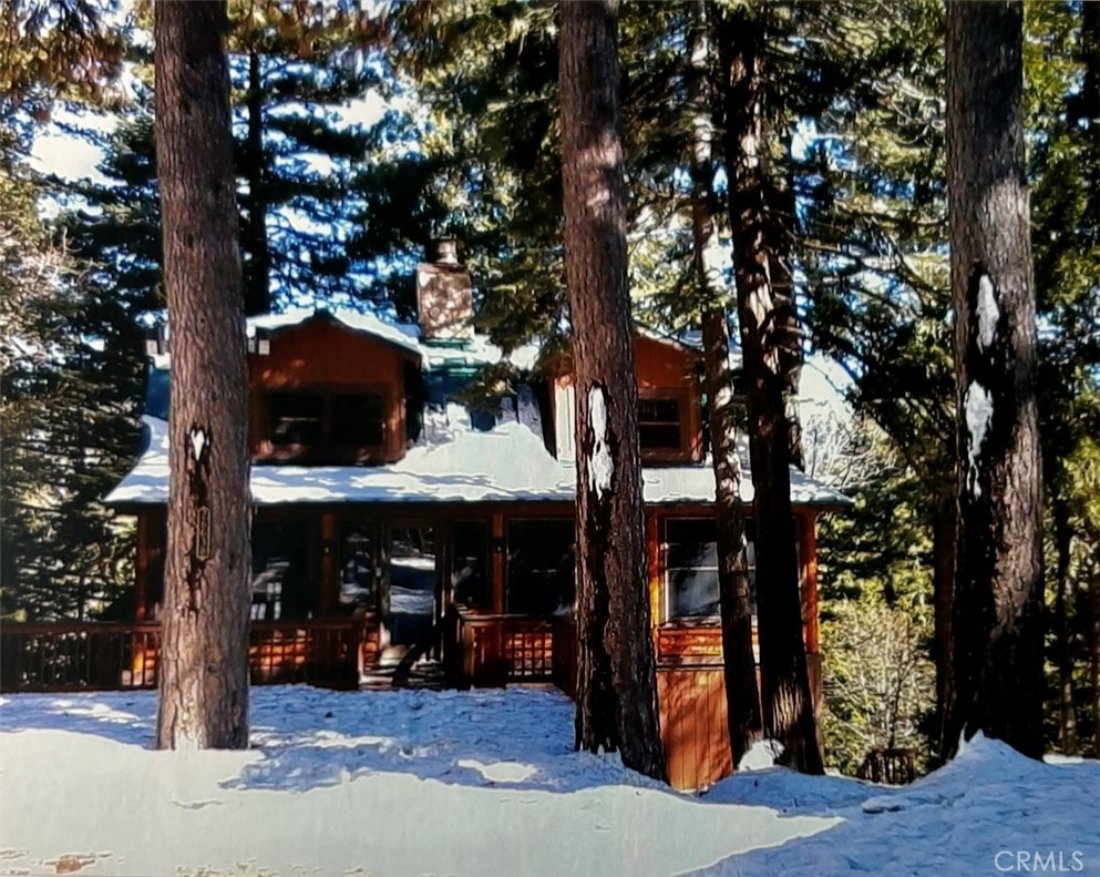 26638 Lake Forest Drive Twin Peaks, CA 92391 - Photo 2 of 72 a view of a house with a tree