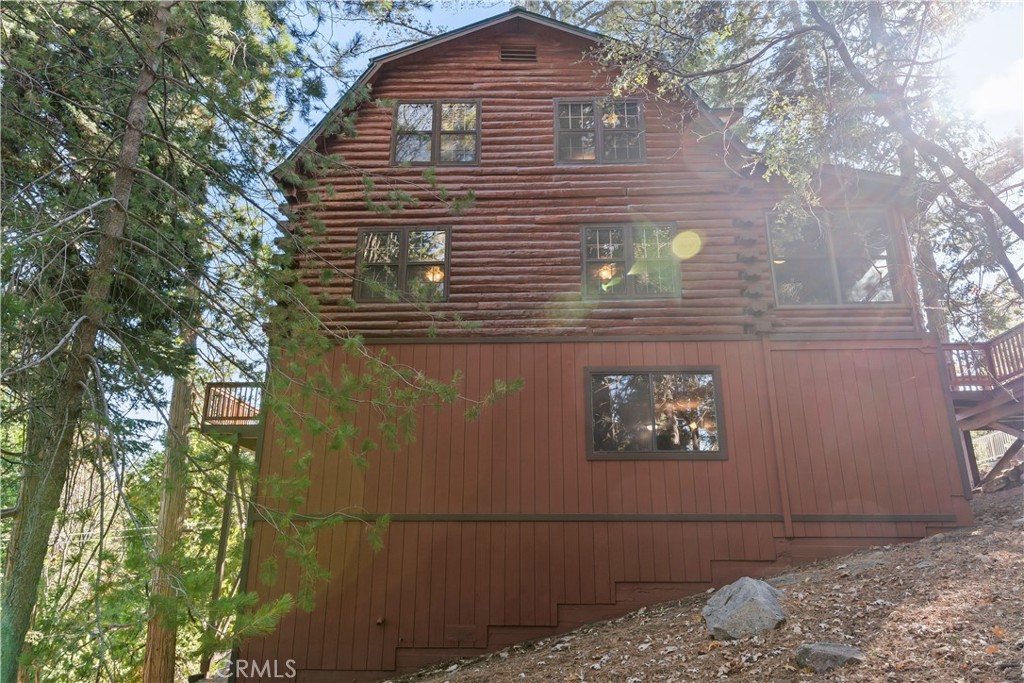 26638 Lake Forest Drive Twin Peaks, CA 92391 - Photo 22 of 72 a view of a house with a tree