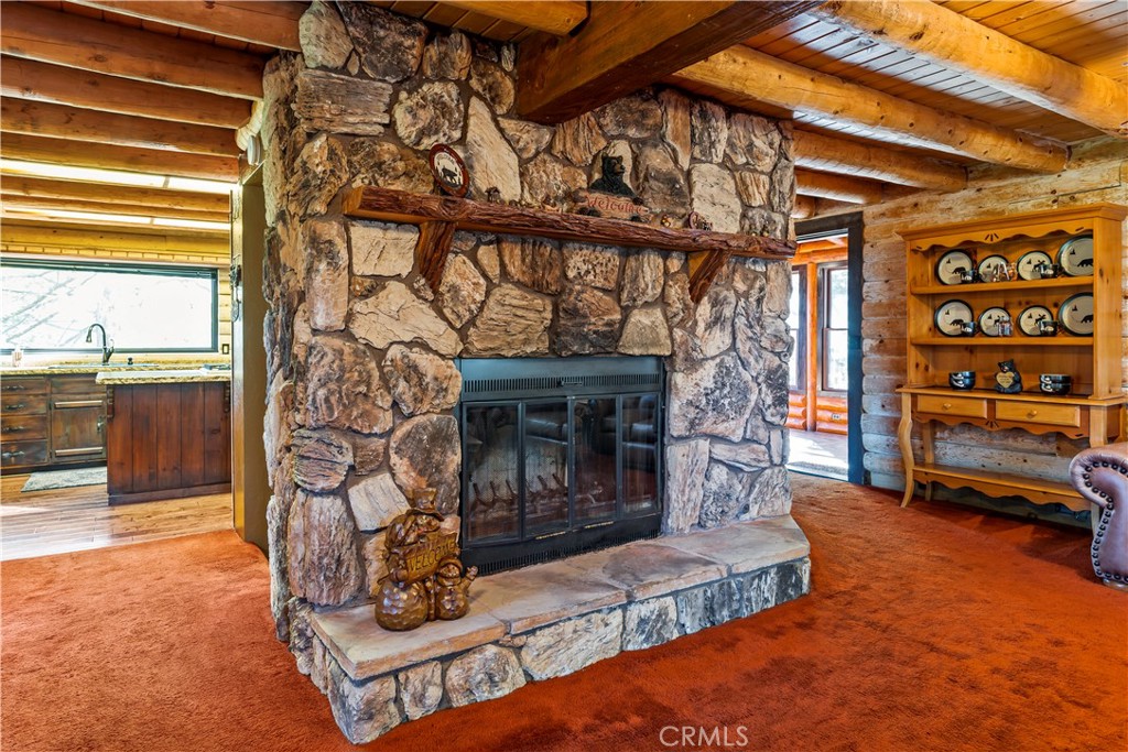 26638 Lake Forest Drive Twin Peaks, CA 92391 - Photo 28 of 72 a building outdoor space with glass windows and couch