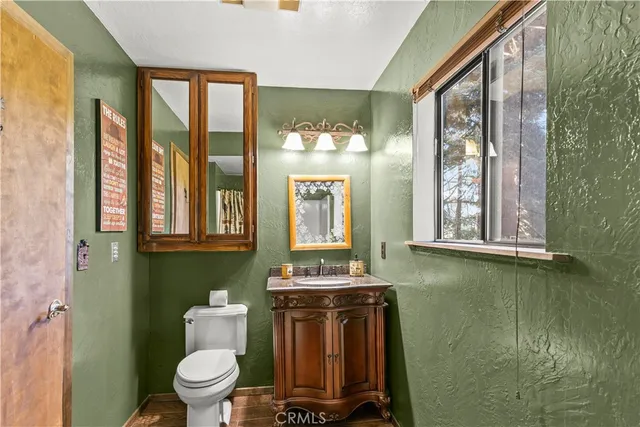 a bathroom with a bath tub and a sink