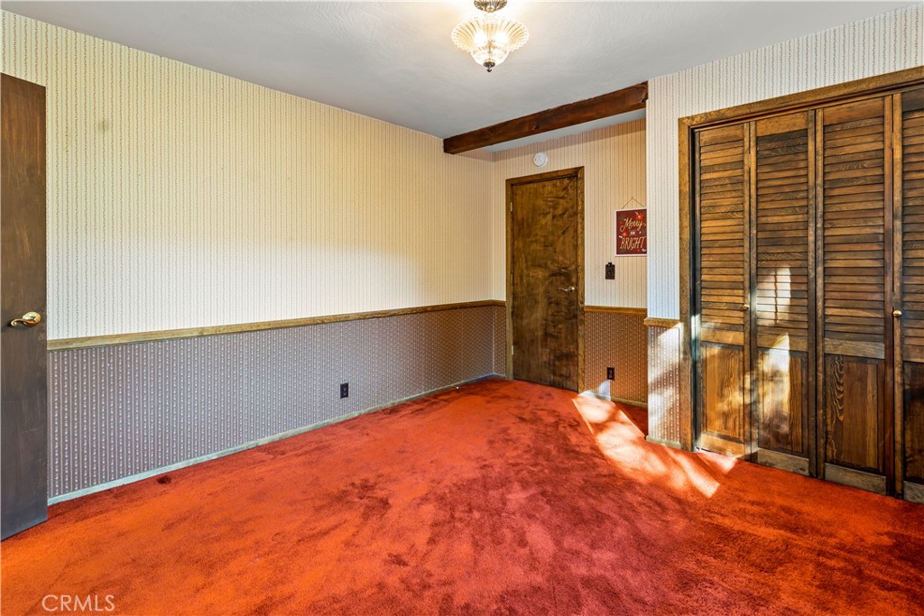 26638 Lake Forest Drive Twin Peaks, CA 92391 - Photo 45 of 72 a view of an empty room with a window