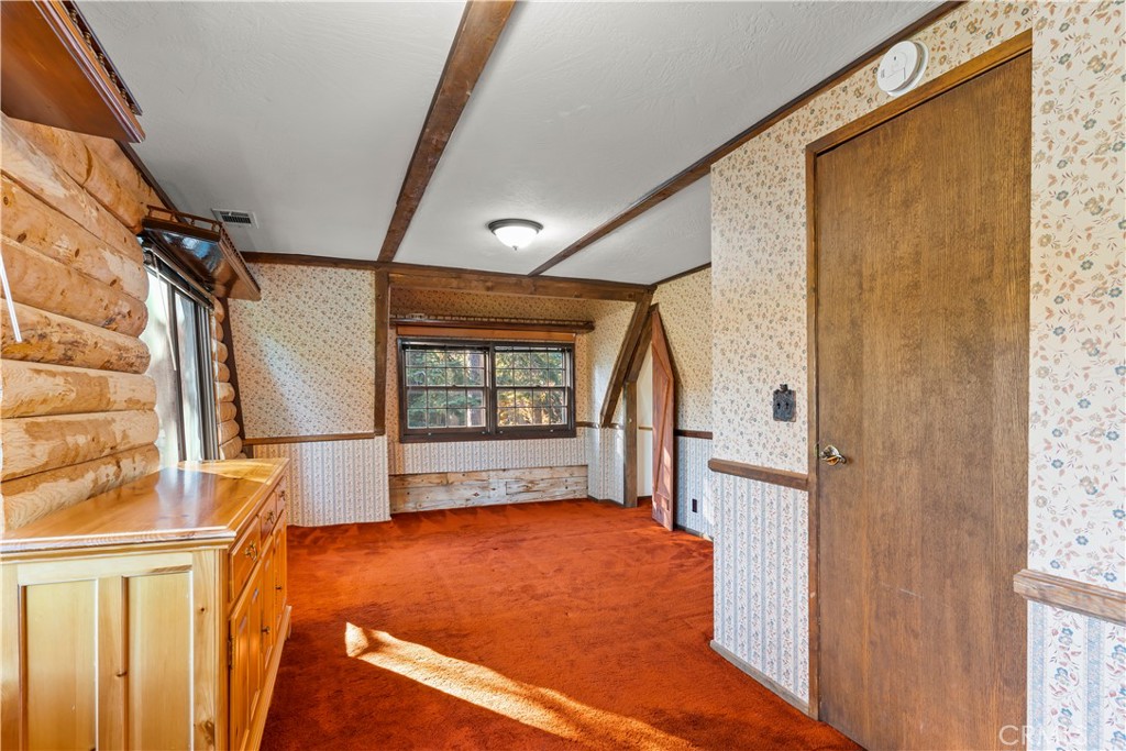26638 Lake Forest Drive Twin Peaks, CA 92391 - Photo 52 of 72 a view of an empty room with a window