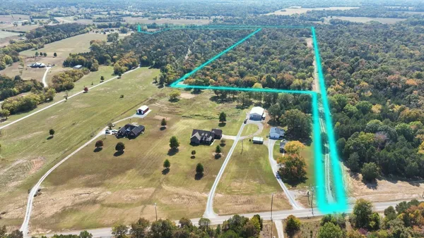 a view of swimming pool with a balcony