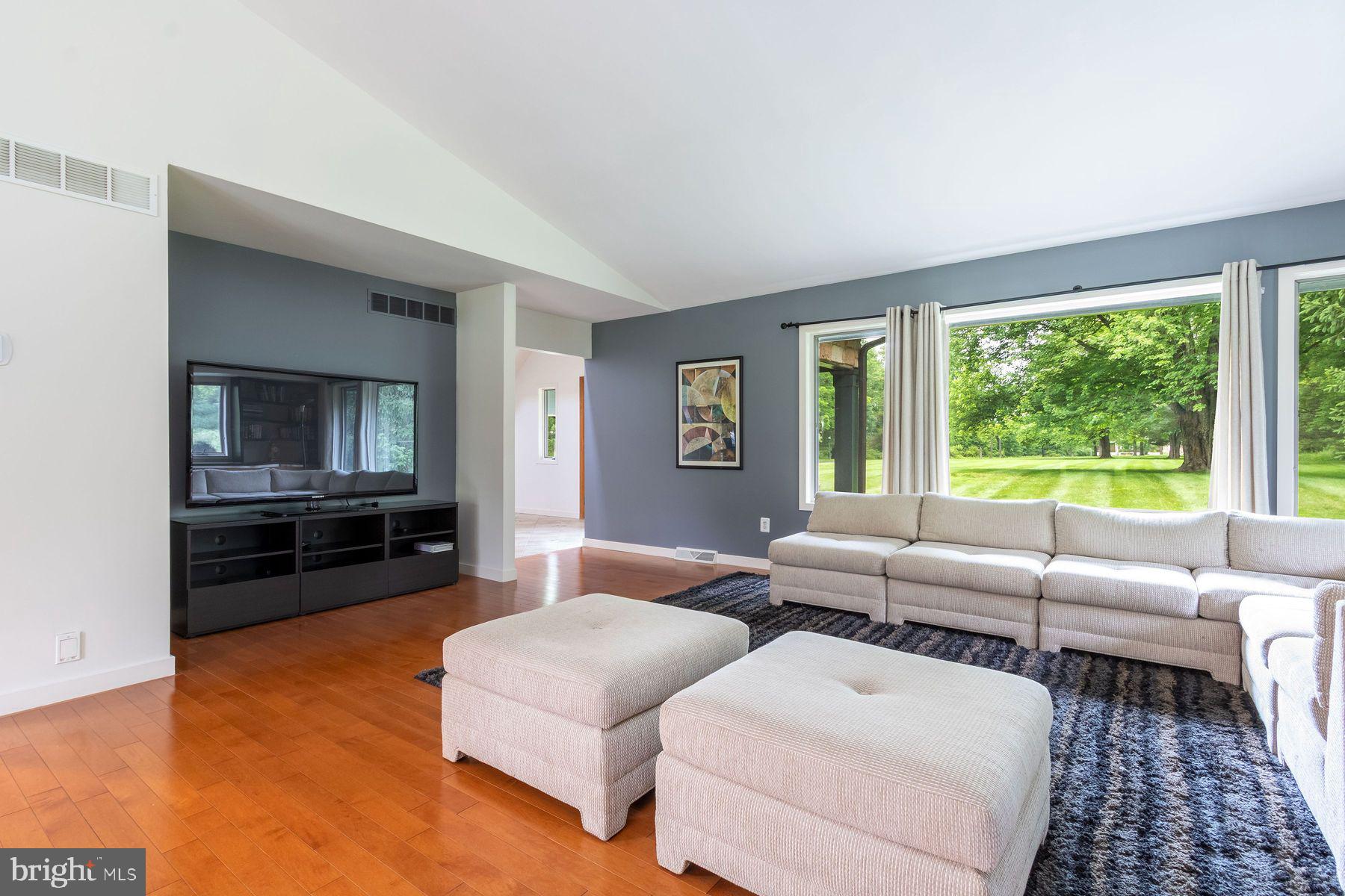 125 Edison Furlong Road Doylestown, PA 18901 - Photo 11 of 51 a living room with furniture and a flat screen tv
