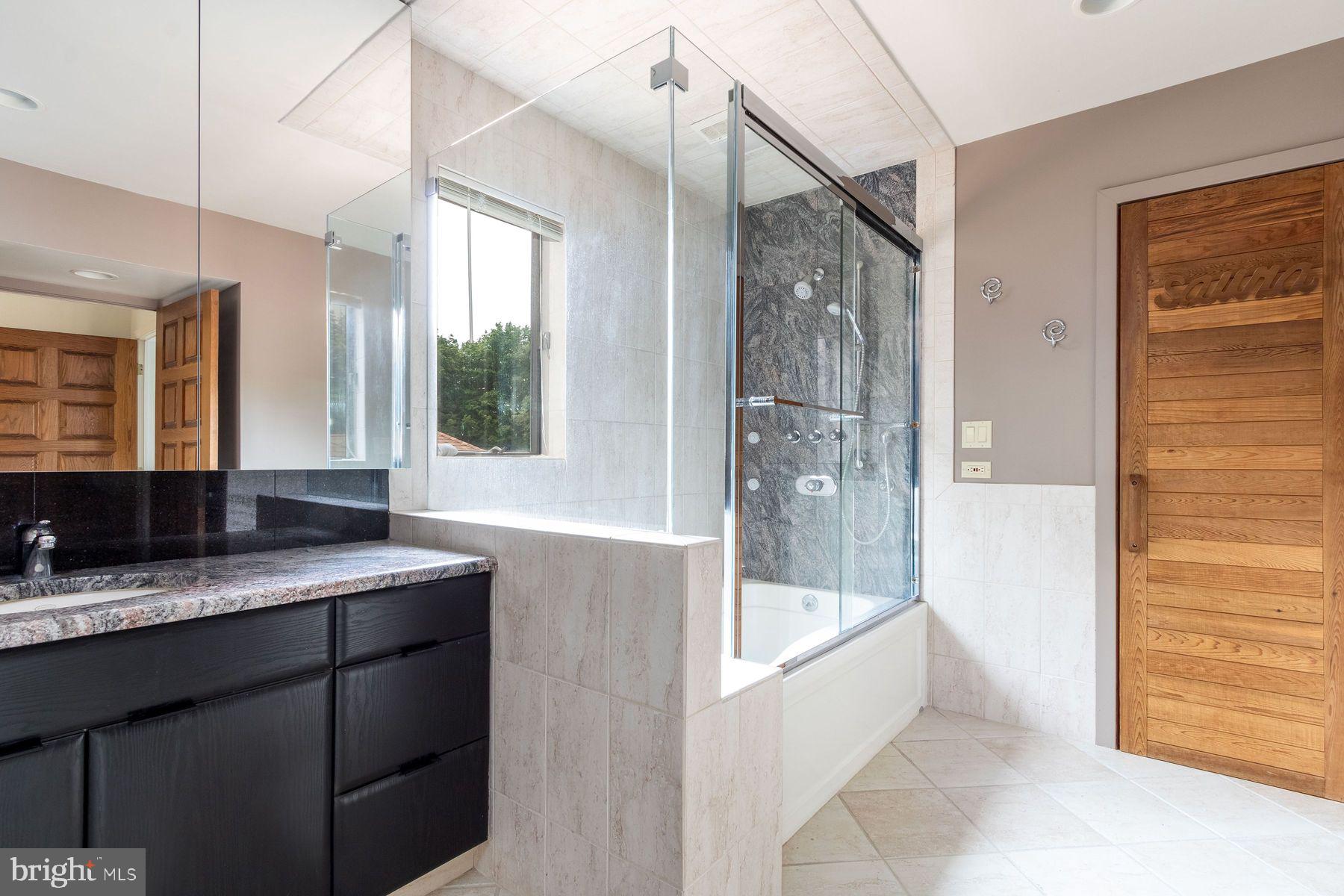 125 Edison Furlong Road Doylestown, PA 18901 - Photo 27 of 51 a bathroom with a granite countertop sink mirror bathtub and shower
