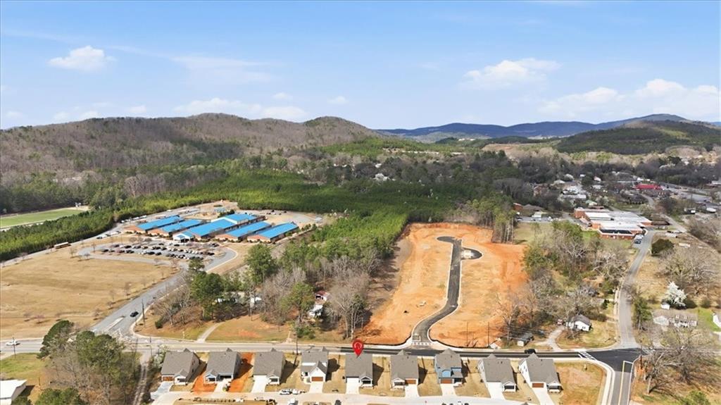 135 Old Alabama Road Southeast Emerson, GA 30137 - Photo 57 of 57 a view of a lake with a mountain in the background