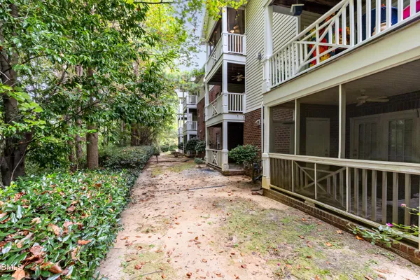 a front view of a house with wooden stairs