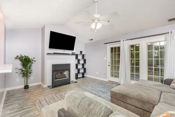 a kitchen with a sink a stove and refrigerator
