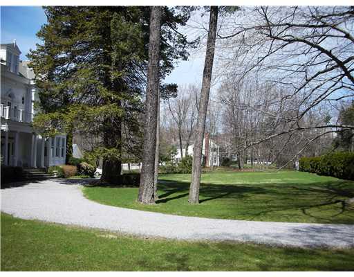 Undisclosed Address Darien, CT 06820 - Photo 2 of 20 a view of a park with large trees