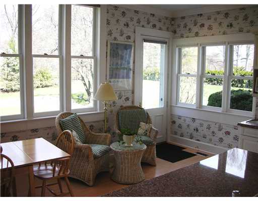 Undisclosed Address Darien, CT 06820 - Photo 12 of 20 a living room with furniture and a large window
