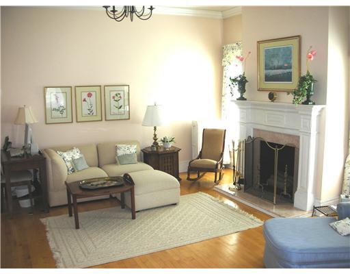 Undisclosed Address Darien, CT 06820 - Photo 16 of 20 a living room with furniture and a fireplace