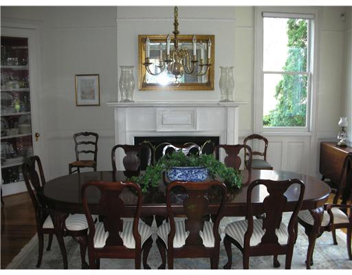 Undisclosed Address Darien, CT 06820 - Photo 8 of 20 a view of a dining room with furniture window and outside view