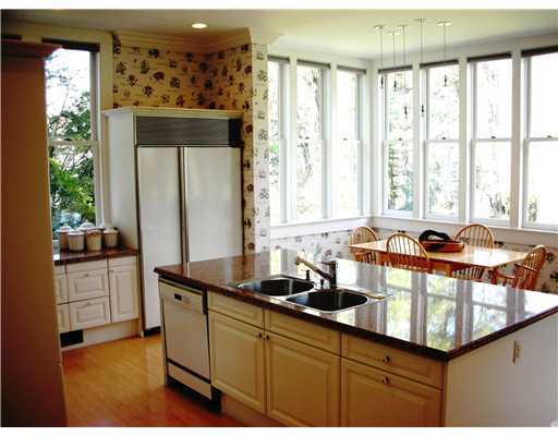 Undisclosed Address Darien, CT 06820 - Photo 9 of 20 a kitchen with sink a window and cabinets