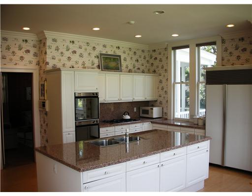 Undisclosed Address Darien, CT 06820 - Photo 10 of 20 a kitchen with stainless steel appliances granite countertop a refrigerator a sink a stove and oven