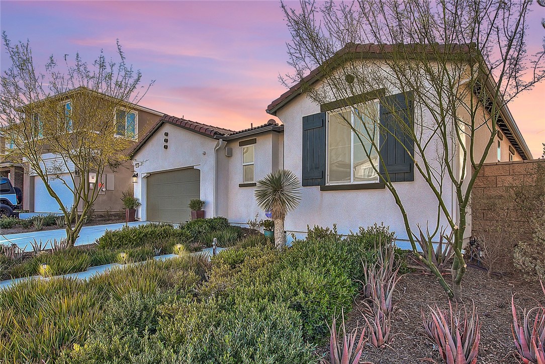 35537 Roxy Road Beaumont, CA 92223 - Photo 1 of 1 a front view of a house with garden