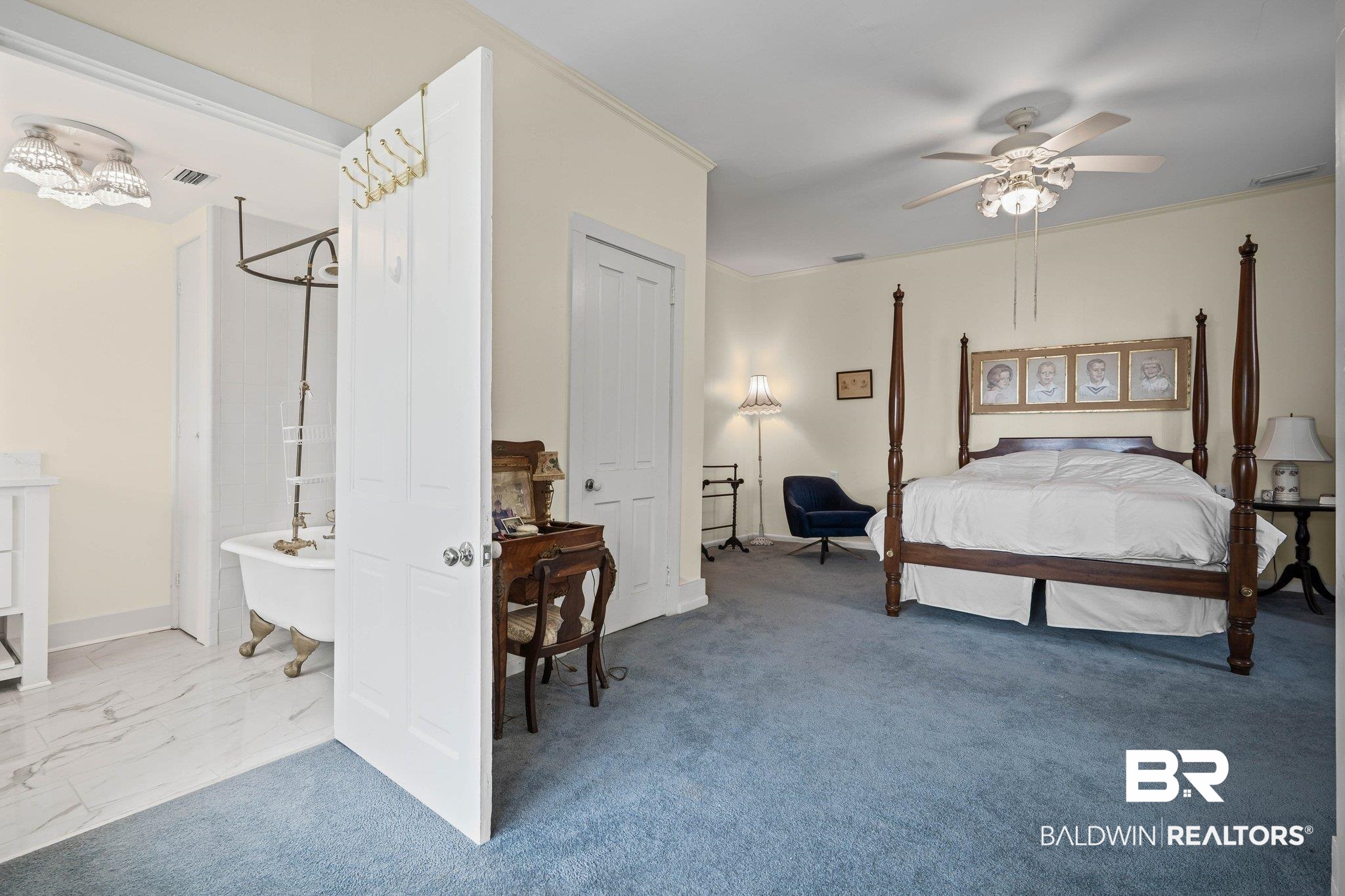 23561 Main Street Fairhope, AL 36532 - Photo 22 of 45 Bedroom with a ceiling fan and marble finish floors