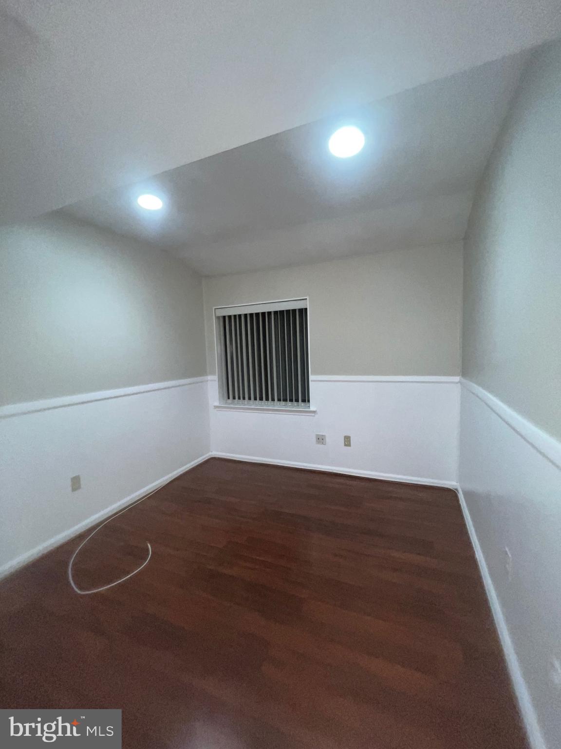 3204 Delaire Landing Road, Unit 3204 Philadelphia, PA 19114 - Photo 4 of 8 a view of an empty room with wooden floor