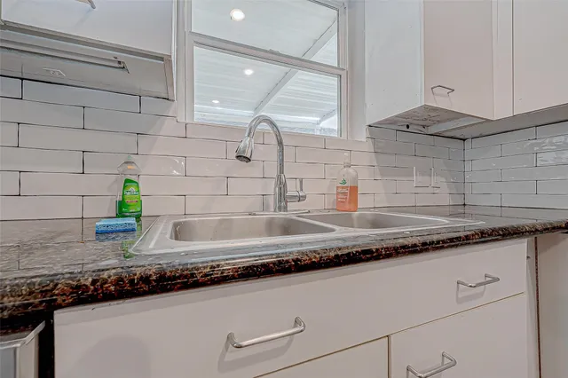 a close view of sink and mirror