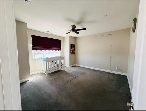 a view of a livingroom with a flat screen tv